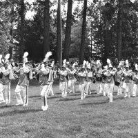 May 1970 - District 4-C4 Convention @ Hoberg’s Resort, Lake County - The Geneva-Excelsior Lions on parade. L to R; 1st row: member, Al Kleinbach, member, member. 2nd row: wife, Pat Ferrera, Maryann Blum, and Estelle Bottarini. 3rd row: Emma Giuffre, Anne Benetti, wife, member. 4th row: Pauline Woodall, Ted Zagorewicz, wife, and Bob Woodall. 5th row: Pat Martin, Gino Benetti, and wife.