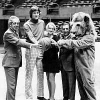 9/1/69 - L to R: District Governor Fred Newman, player, guest, Charlie Bottarini (Trustee, LEF), and Lion Mascot.