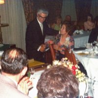 6/21/75 - Installation of Officers, Presidio Golf Club, San Francisco - L to R: standing: Ozzie Buoncristiani; seated: guest, guest; in background: Betty Gentile (green dress) and Al Kleinbach.