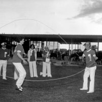 May 1977 - District 4-C4 Convention, El Rancho Tropicana, Santa Rosa - Foreground: Eva Bello (jumping) and Charlie Bottarini; background: Pete Bello, Margot Clews, and Emma Giuffre.