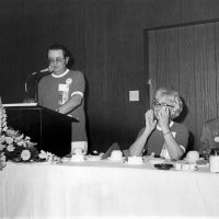 May 1977 - District 4-C4 Convention, El Rancho Tropicana, Santa Rosa - Ron Faina, DDG addressing the convention as Linnie Faina applauds.