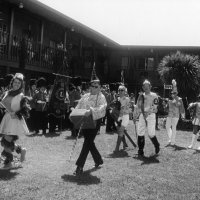May 1977 - District 4-C4 Convention, El Rancho Tropicana, Santa Rosa - The Millbrae Lions are in background dressed as Queen’s Guards. L to R: Eva & Pete Bello (organ grinders and monkeys, 1968), Linnie & Ron Faina (jockeys, 1969), and Bob & Pauline Woodall (marching band, 1970), and Estelle Bottarini (partial, scotsmen, 1974).