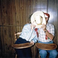 5/14/86 - District 4-C4 Convention, El Rancho Tropicana, Santa Rosa - Western Barbecue - Diane Johnson and Charlie Bottarini sitting in high chairs having a smooch?
