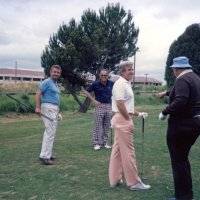 5/14/86 - District 4-C4 Convention, Santa Rosa - Golf Tournament - First event of the convention on Wednesday morning - Ron Faina (left edge) and Handford Clews (brown sweater) talking with the group in front of them while waiting.
