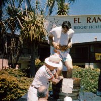 5/17/86 - District 4-C4 Convention, El Rancho Tropicana, Santa Rosa - Grape Crushing Competition - Dick Johnson catching the juice, Frank Ferrera mixing the grapes, Lyle Workman stomping the grapes, and John Madden holding up Lyle.