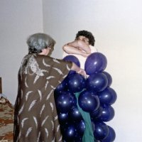 May 1987 - District 4-C4 Convention, El Rancho Tropicana, Santa Rosa - Costume Parade - Pat Ferrera (left) helping Estelle Bottarini in to her costume.