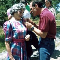 May 11, 1987 - Birthday party for Harriet Kleinbach - Harriet getting “pinned” with a corsage.