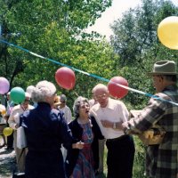 May 11, 1987 - Birthday party for Harriet Kleinbach - Harriet, center, being surprised by a guest.