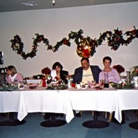 12/7/05 - Club Christmas Party at the Sharp Park Golf Course Restaurant, Pacifica - L to R: John Jones & Bre Martinez, Zenaida Lawhon (her husband Bob Lawhon taking the photo), George & Kathy Salet, and Ward Donnelly enjoying dinner.