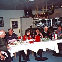 12/7/05 - Club Christmas Party at the Sharp Park Golf Course Restaurant, Pacifica - L to R: Bob Menicucci, Handford Clews, LaVerne Cheso, Margo Clews, Al Gentile, Bill Graziano, and Ted Wildenradt enjoying dinner.