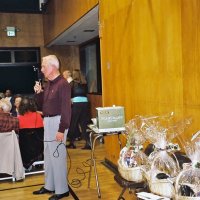 2/25/06 - 24th Annual Crab Feed at the Janet Pomeroy Center For The Handicapped - 470 attendees - Ward Donnelly preparing to announce raffle winners. Some the available prizes were gift baskets prepared by Zenaida Lawhon.