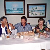 8/17/05 - Sharp Park Golf Course, Pacifica - A birthday boy with a surprise cake. Seated: guest, birthday boy, Laverne Cheso, and Lion Dick Johnson.