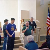 12/12/05 - Lowell Leo Club at Coventry Presbyterian Church, San Francisco - Lowell Leo Club members with Lion Bob Lawhon (with mic), and David Brown, on his left, talking with guests about the Coventry Food Pantry.