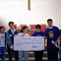 12/12/05 - Lowell Leo Club at Coventry Presbyterian Church, San Francisco - Lowell Leo Club members presenting a $150 donation to the Coventry Food Pantry. Lion Bob Lawhon is on the far right.