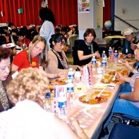 11/22/05 - Mission Educational Center, San Francisco - Teaches and principal Deborah Molof (in center with black dress) enjoying their lunch.