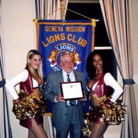 10/19/05 - 49er Night at the Cliff House, San Francisco - President Bob Lawhon posing with the “Gold Rush” girls with their Certificate of Appreciation in hand.