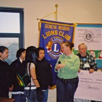 12/15/05 - Luther Burbank Middle School - Lion President Bob Lawhon making a presentation to the technology department of $2,500 to keep their equipment in working order.
