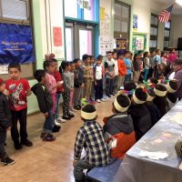 11/16/17 - Serving Thanksgiving Luncheon, Mission Educational Center - One of the classrooms entertaining the group and volunteers.