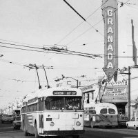 From Facebook - 1965-66 - Ocean Avenue and Mission Street with the 14 Mission passing by the the Granada Theater playing The Sound of Music, released March 31, 1965.