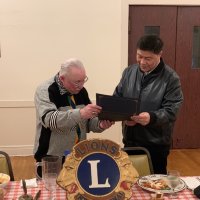 1-18-23 - Italian American Social Club, San Francisco - Bob Lawhon presenting JP Verzosa with his membership cartificate.