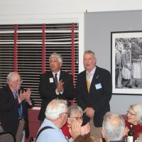 7-19-23 - Basque Cultural Center, South San Francisco - 74th Installation of Officers - Officially installed, Steve Martin, right, accepts applause from the gathering. To his left are PDG Mario Benavente and outgoing President Bob Lawhon.