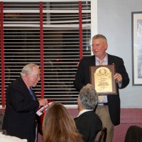 7-19-23 - Basque Cultural Center, South San Francisco - 74th Installation of Officers - Steve Martin showing off Bob Lawhon’s Past President’s plaque as Bob Lawhon looks on.