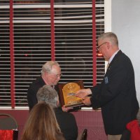 7-19-23 - Basque Cultural Center, South San Francisco - 74th Installation of Officers - Steve Martin, right, presenting Bob Lawhon with his new name badge engraved as the Club’s only 5x Past President.