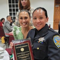 4-26-24 - by Steve Martin - SFCCLC 61st Annual Police, Firefighters, & Shreriffs Award Night, Dominic’s San Francisco - SF Police Officer Christina Galande, and friends, proudly displaying her award plaque received at the Awards Banquet.