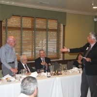 8-21-24 - 75th Installation of Officers, Basque Cultural Center, South San Francisco - Standing are Mario Benavente giving Bill Graziano his charge as Vice President. Seated are, L to R: Bob Lawhon, Joe Farrah, Stephen Martin, and Rose Benavente. Mike Foti in the foreground.