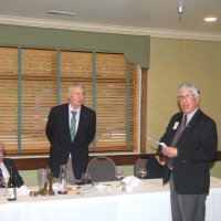 8-21-24 - 75th Installation of Officers, Basque Cultural Center, South San Francisco - Standing are Mario Benavente giving Steven Martin his charge as President. Seated is Joe Farrah.